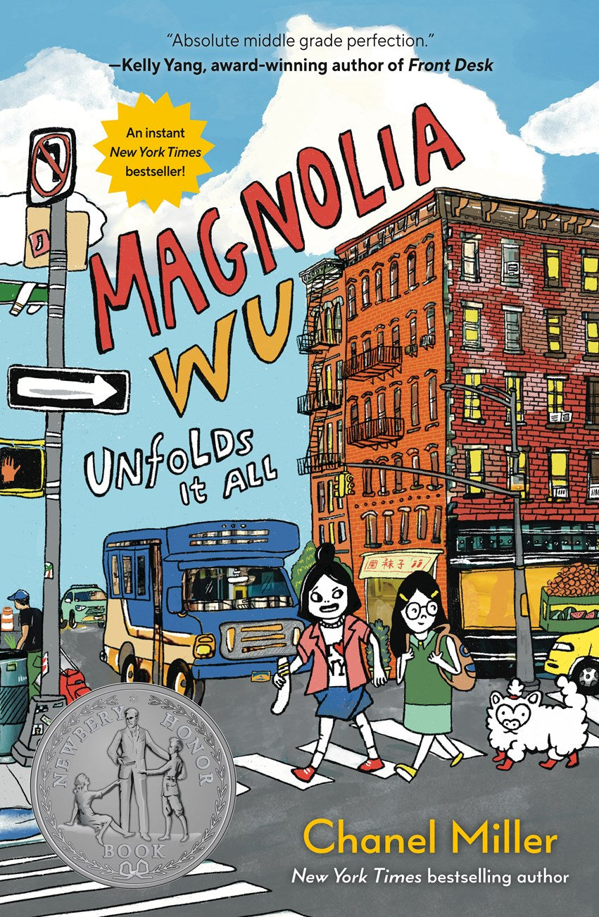 The illustrated cover of "Magnolia Wu Unfolds It All" by Chanel Miller (Signed!), available from Yu & Me Books, shows two girls crossing a city street, with buildings, a bus, traffic lights, a Newbery Honor medal, and praise from Kelly Yang.