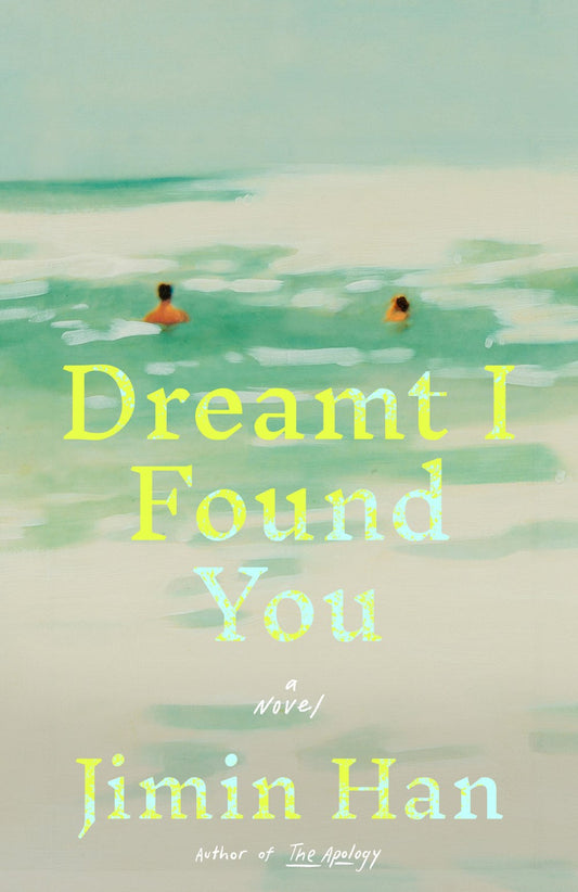Two people swim in a calm, pastel ocean beneath a dreamy sky. The cover says: Dreamt I Found You by Jimin Han (Signed & Personalized!), available from Yu & Me Books.