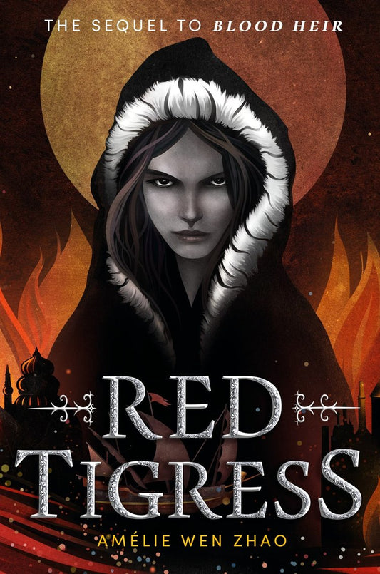 Red Tigress by Amélie Wen Zhao (Signed & Personalized!) from Yu & Me Books features a striking cover with a stern woman in a hooded fur cloak, flames and city silhouettes behind her, and bold silver title text at the bottom.