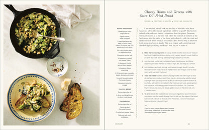 A signed copy of Maxi's Kitchen by Maxine Sharf (Yu & Me Books) shows “Cheesy Beans and Greens with Olive Oil–Fried Bread” plated with toasted bread on the left page, and the recipe text on the right. Limited quantity available.