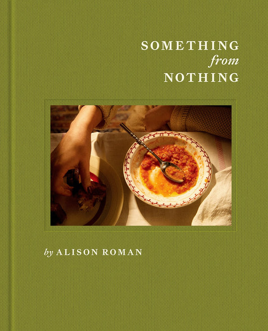 A green cover edition of "Something from Nothing by Alison Roman (Signed! Limited Qty!)" from Yu & Me Books features a hand reaching for food next to a bowl of tomato sauce and ricotta on a table.