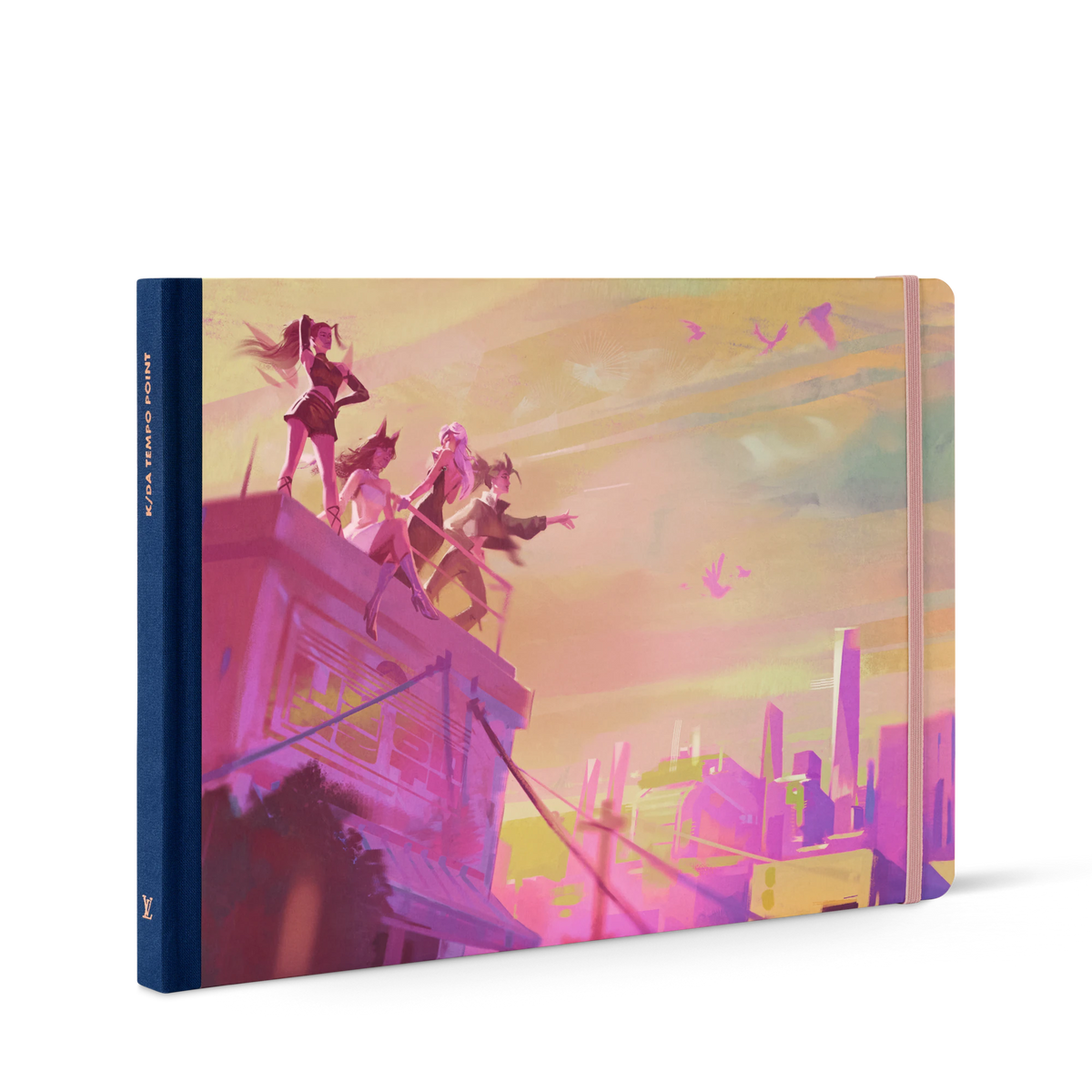 Hardcover K/DA’s Evolution with Art Director Airi Pan travel book with a pink and orange illustrated cover depicting four K/DA characters standing on a rooftop overlooking a city skyline.