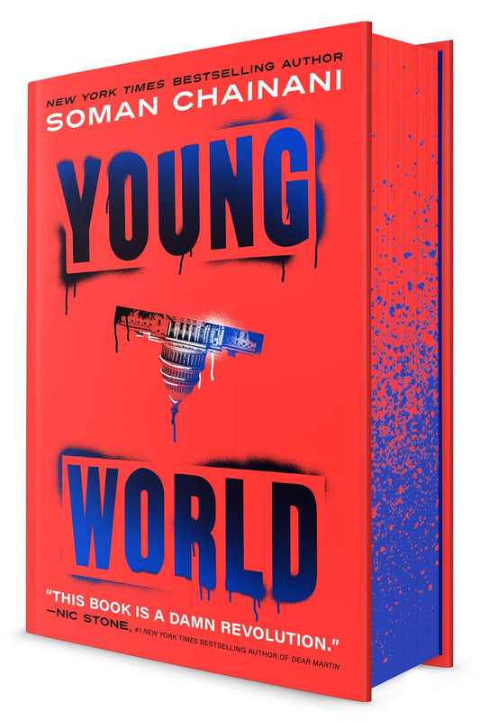 The signed, personalized "Young World" by Soman Chainani (Yu & Me Books) has a bright red cover with bold blue text, an upside-down spray-painted Capitol, and blue-speckled edges—hinting at this thrilling teen president novel.