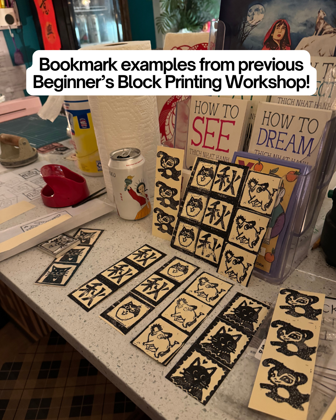 Handmade black ink animal bookmarks for the Beginner's Block Printing Workshop with Kintsugi Print Studio by Yu & Me Books, displayed next to “How to See,” “How to Dream,” and “How to Sit,” with a soda can and craft supplies nearby.